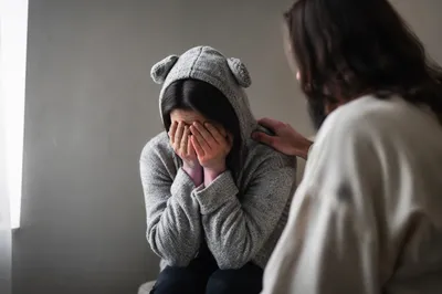 Jesus Comforting Crying Woman in Quiet Grace