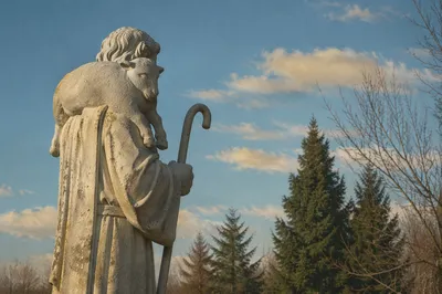 Good Shepherd Statue with Lamb Outdoors