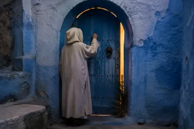 Jesus Knocking at Blue Arched Door