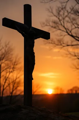 Jesus Silhouette on Cross at Sunset