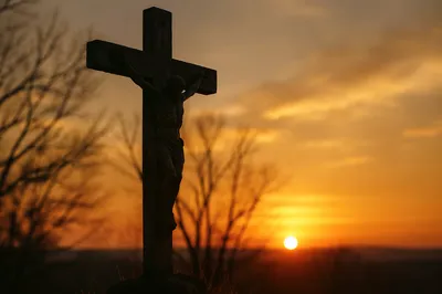 Silhouetted Cross at Calvary Sunset