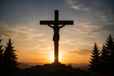 Jesus Silhouette on Cross at Sunset