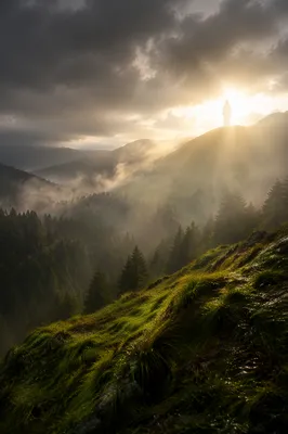 Glowing White Figure on Misty Mountain Ridge