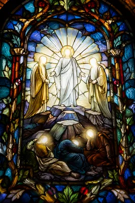 Glowing Transfiguration Stained Glass on Mountain