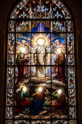 Glowing Transfiguration Stained Glass on Mountain