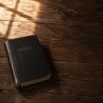 Leather Bible on Rustic Dark Wood