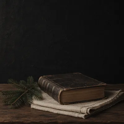Leather Bible on Dark Walnut Table
