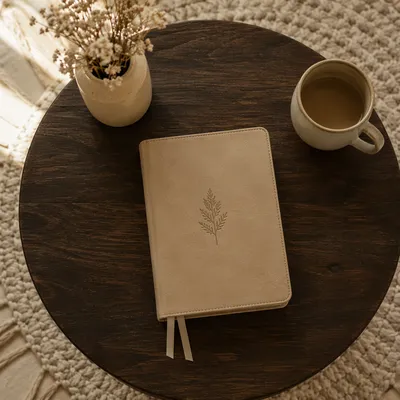 Leather Bible on Dark Wooden Table