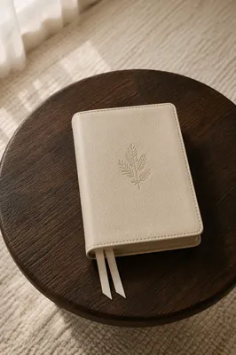 Leather Bible on Dark Walnut Table