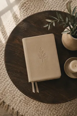 Leather Bible on Dark Wooden Table