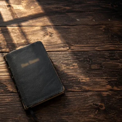 Leather Bible on Rustic Dark Wood
