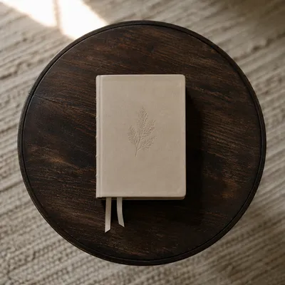 Leather Bible on Dark Wooden Table