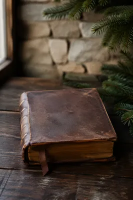 Weathered Leather Bible on Dark Walnut