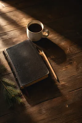 Leather Bible on Rustic Wood Table