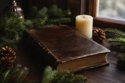 Leather Bible on Dark Walnut Table
