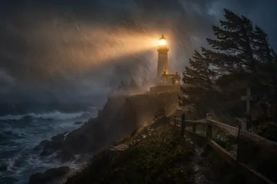 Lighthouse Beacon Through Stormy Evergreen Coast