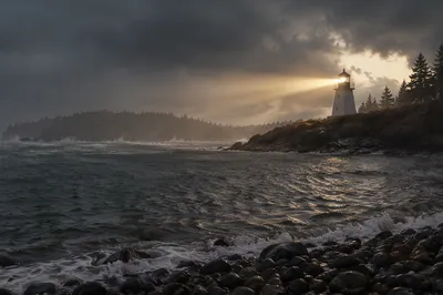 Lighthouse Beacon Through Stormy Coastal Waters