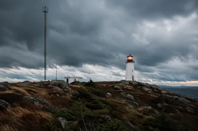 Stormy Evergreen Coast Lighthouse Beacon