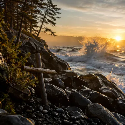 Driftwood Cross by Sunrise Ocean Waves