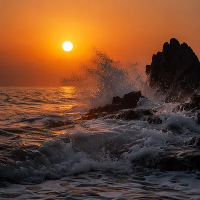Sunrise Waves Crashing on Volcanic Rocks