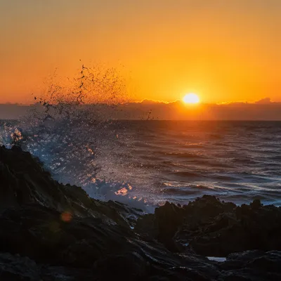 Ocean Waves Crashing at Golden Sunrise