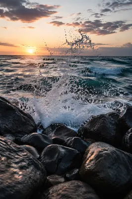 Sunrise Waves Crashing on Volcanic Rocks