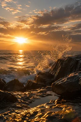 Sunrise Waves Crashing on Rocky Shore