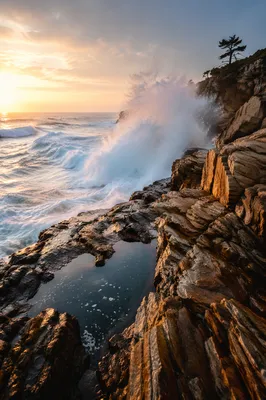 Sunrise Waves Crashing on Rugged Coastal Rocks