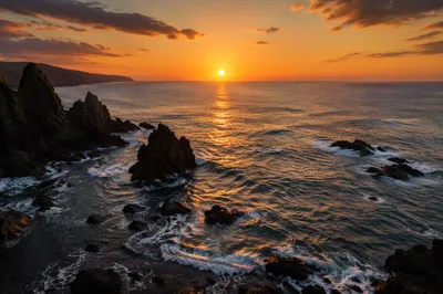 Sunrise Waves Crashing on Volcanic Rocks