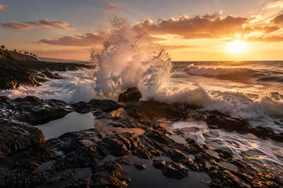 Sunrise Waves Crashing on Volcanic Rocks