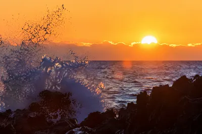 Ocean Waves Crashing at Golden Sunrise