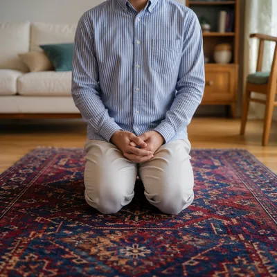 Person Kneeling in Prayer at Home