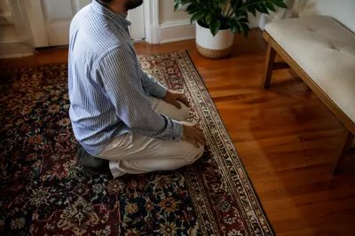 Quiet Kneeling Prayer in Cozy Home