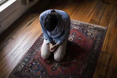 Quiet Kneeling Prayer on Vintage Rug
