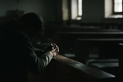 Quiet Prayer Beside Wooden Chapel Pew