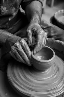 Potter Hands Shaping Clay Bowl