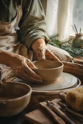 Evergreen Potter Hands Shaping Clay