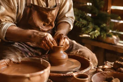 Potter Hands Shaping Clay in Evergreen Studio