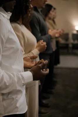 Prayer Group Hands Joined in Fellowship