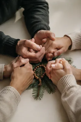 Prayer Group Hands with Evergreen Sprigs
