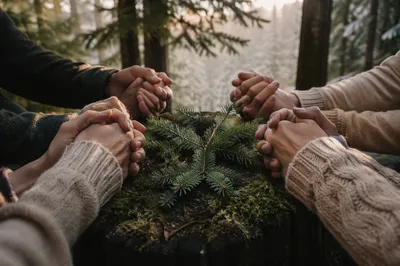Prayer Group Hands in Evergreen Forest
