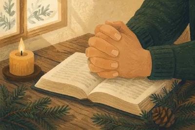 Praying Hands on Bible with Evergreen Candle