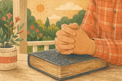 Praying Hands on Bible in Morning Light