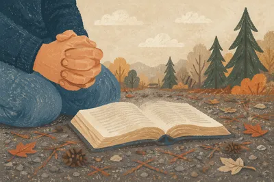 Praying Hands Beside Bible on Evergreen Path