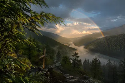 Rainbow Over Peaceful Evergreen Valley