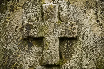 Rugged Stone Cross with Moss Texture
