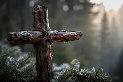 Rugged Wooden Cross in Evergreen Dawn