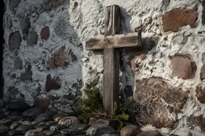 Rugged Wooden Cross with Evergreen Sprigs