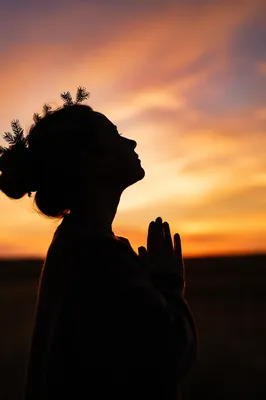 Silhouette Prayer at Golden Sunset