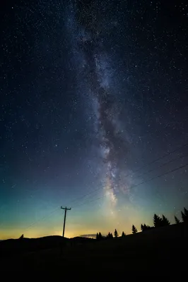 Milky Way Over Evergreen Rural Hillside